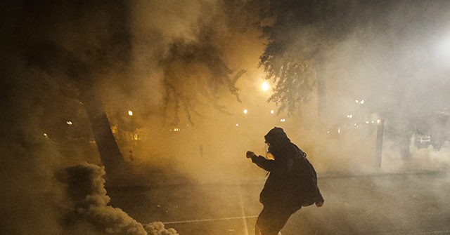 WATCH: Gunshots Ring Out as Armed Rioters Confront Police in
Wisconsin 1