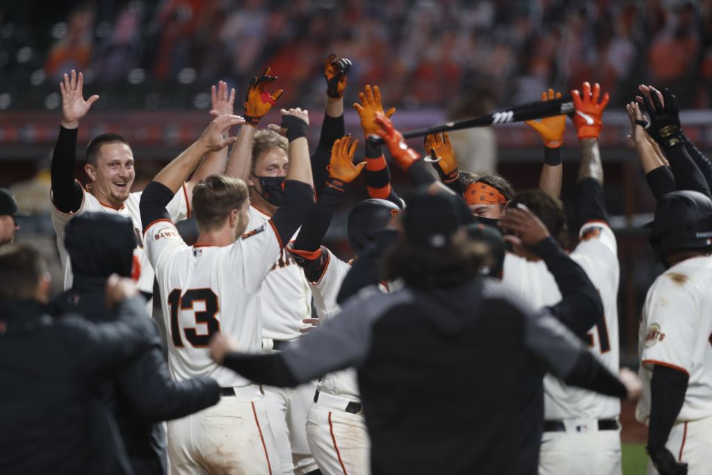 Inside the SF Giants’ (somewhat) socially distant walk-off
celebration in the coronavirus age 1