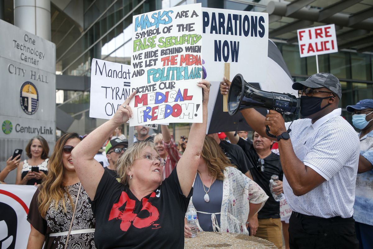 Black Tulsa pastor says he’s filing charges against racist
protesters 1