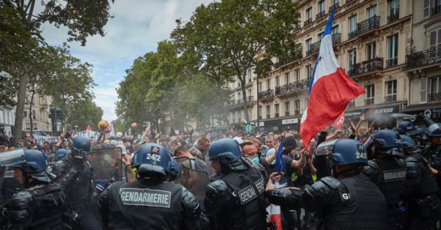 Bastille Day Battle: Antifa and Protesters Clash With Police
in Paris 1