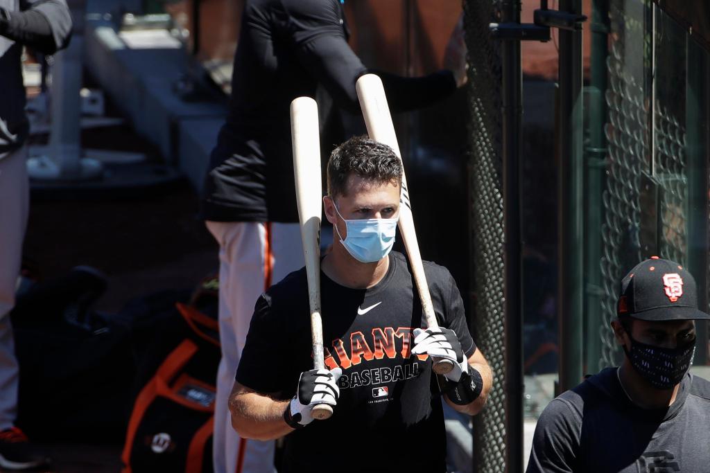 Giants star catcher Posey out this year over COVID-19
concerns 1