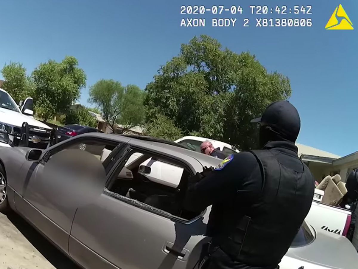 Man inside parked car fatally shot by Phoenix police,
leading to protests 1