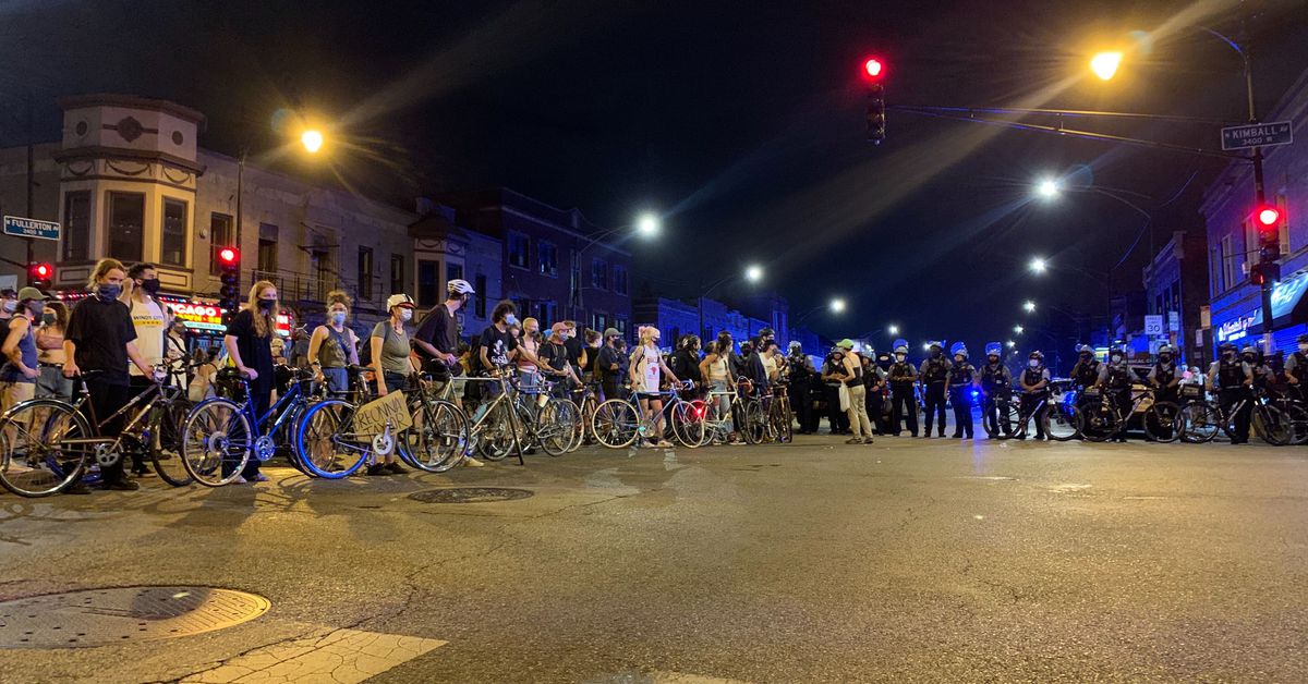 Protestors gather near Lightfoot’s Logan Square home to
protest city’s handling of Grant Park demonstration 1