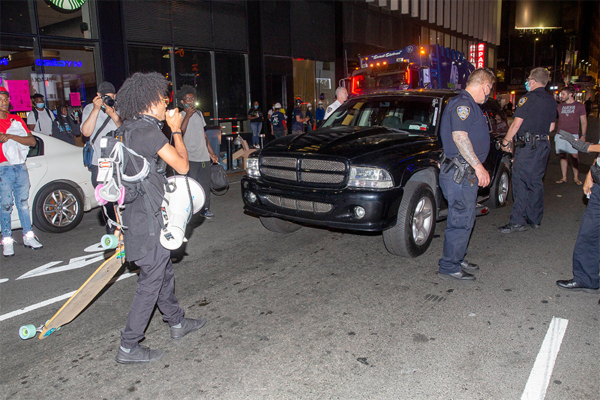 SUV driver runs over bicycles, through NYC Black Lives
Matter protest 1