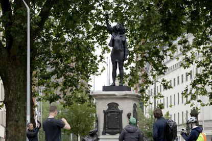 Statue of Black Lives Matter protester erected in place of
recently toppled slave trader 1 Statue of Black Lives Matter protester erected in place of
recently toppled slave trader 1