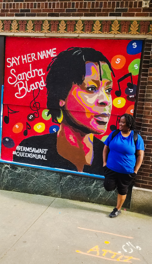 Artists create mural at Downtown business vandalized during
protests 1
