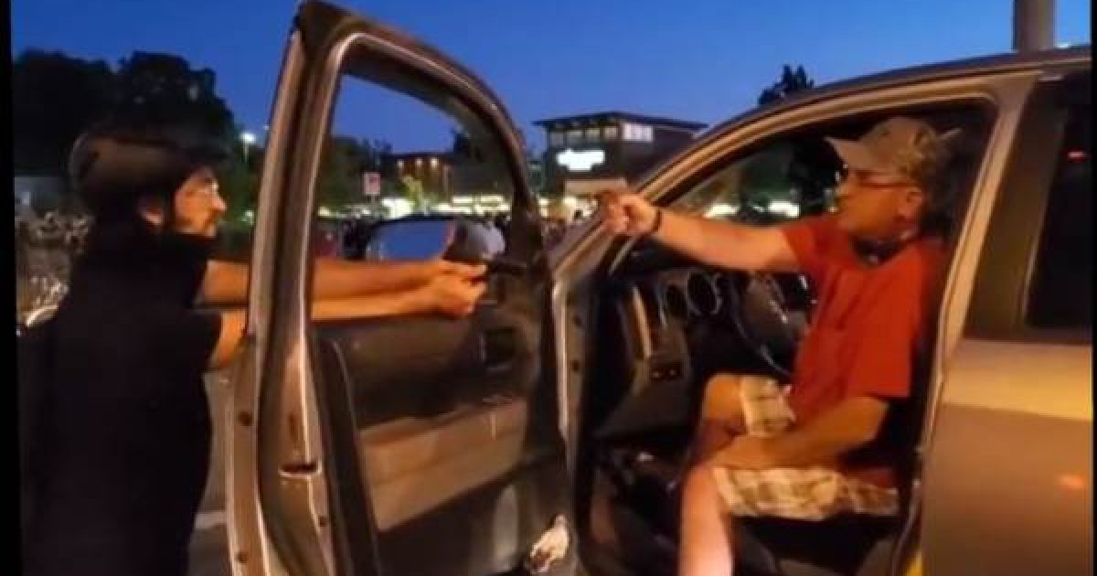ANOTHER Armed “Protestor” Pulls a Gun on Motorist Trapped by
Mob of Black Lives Matter in Oregon 1
