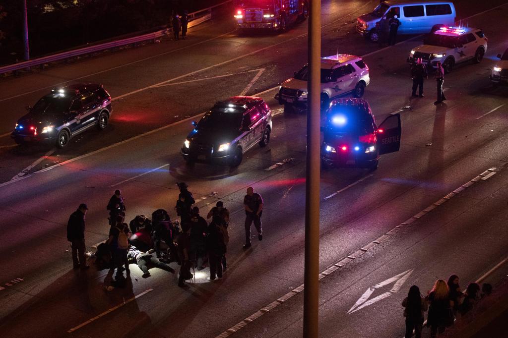 $1.2 million bail for driver that hit 2 Seattle
protesters 1