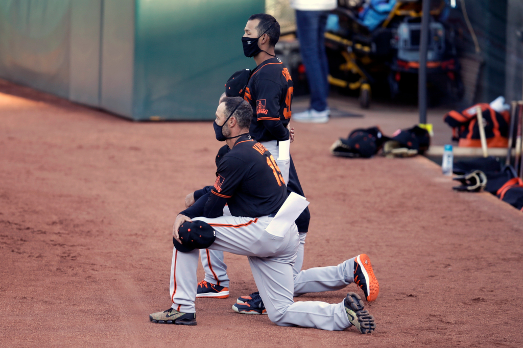 Giants’ Gabe Kapler posts heartfelt note on why he took a
knee in protest 1