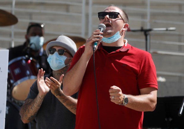 San Jose church protests California coronavirus singing ban
with live band at City Hall 1