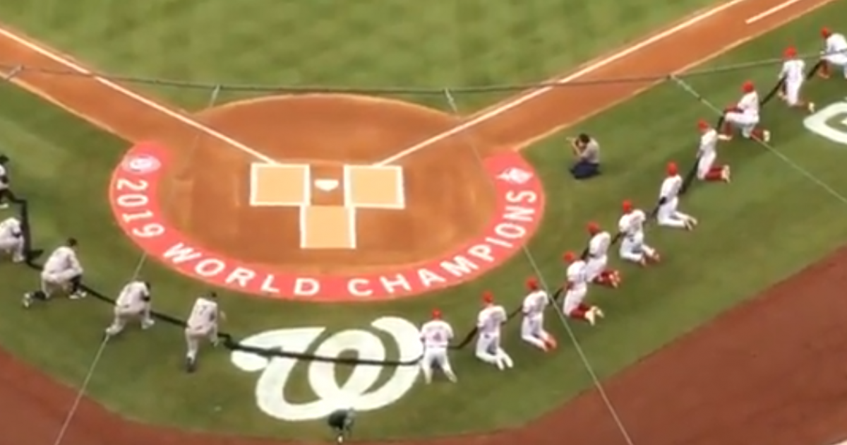 Entire Nationals, Yankees Rosters Kneel Before National
Anthem on Opening Day 1
