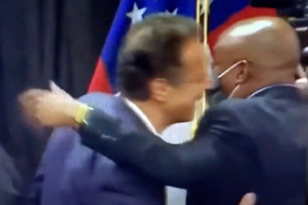 Video shows mask-less Gov. Cuomo hugging mayor of Savannah,
Ga. 1