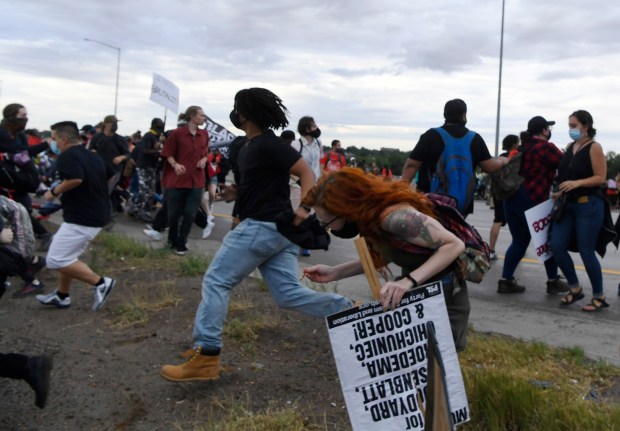 “I didn’t realize I’d entered a war zone”: Demonstrators,
officials take stock after violence at Aurora protest 1