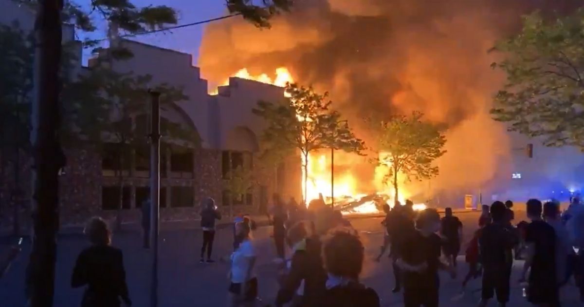 Riot Death Toll Creeps Higher as Charred Body Found Under
2-Month-Old Rubble of Torched Pawn Shop 1