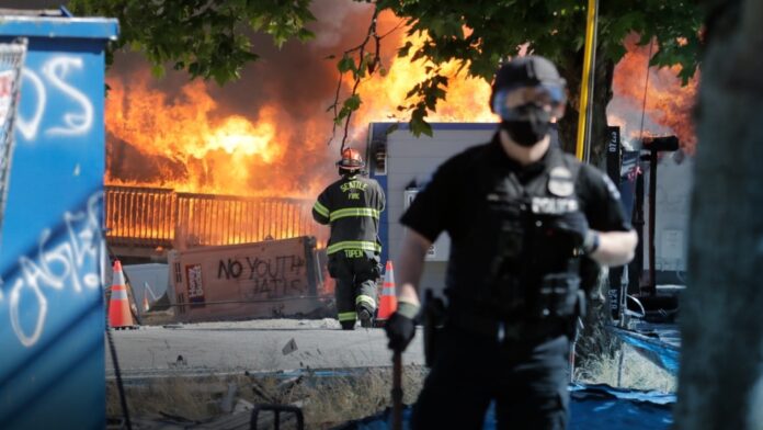 American Protests: Demonstrations, Violent Riots Expected to
Continue Throughout The Country 1