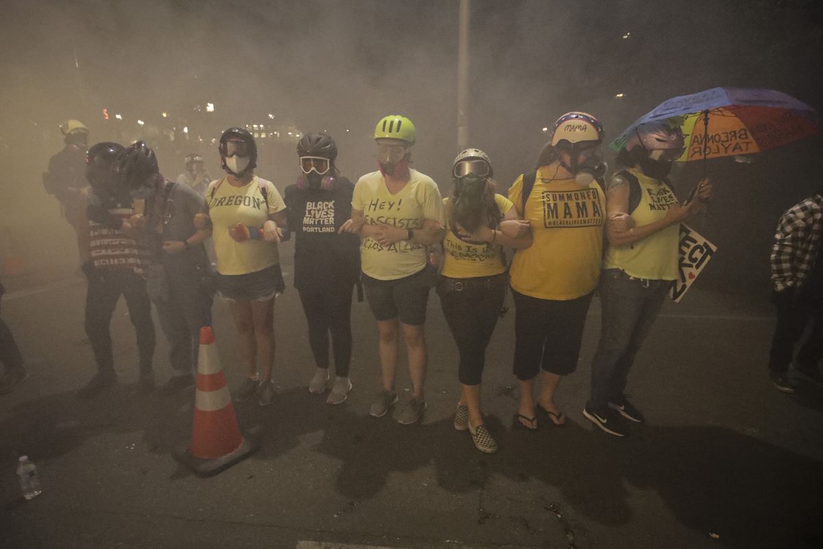 ‘Wall of Moms’ sues Trump administration for ‘gassing,
beating, and kidnapping’ protesters in Portland 1