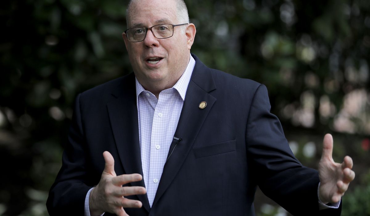 Maryland pauses reopening plan, issues travel
advisory 1
