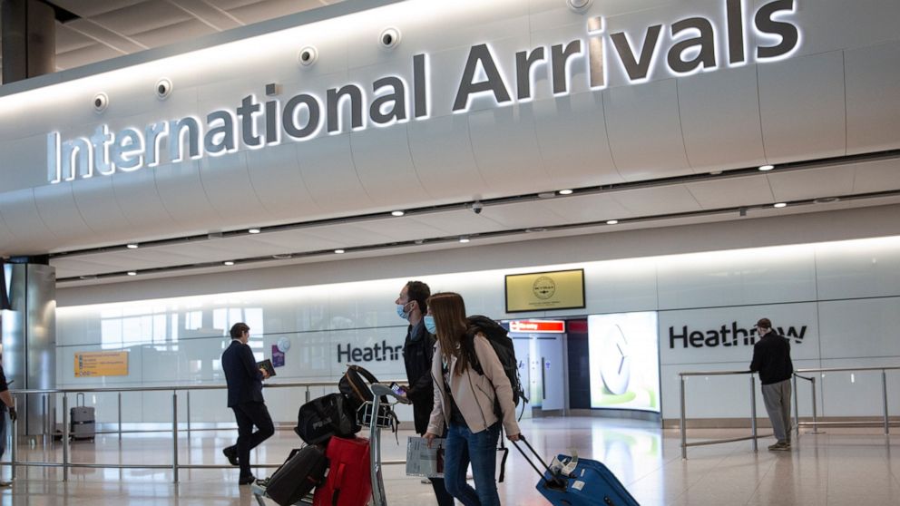 UK scraps quarantine for some visitors as pubs set to
reopen 1