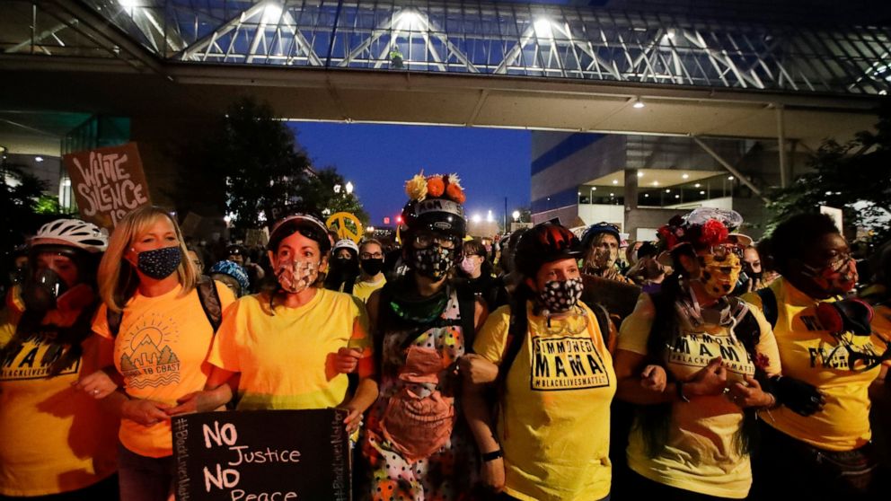 Protesters sue Trump administration over Portland
tactics 1