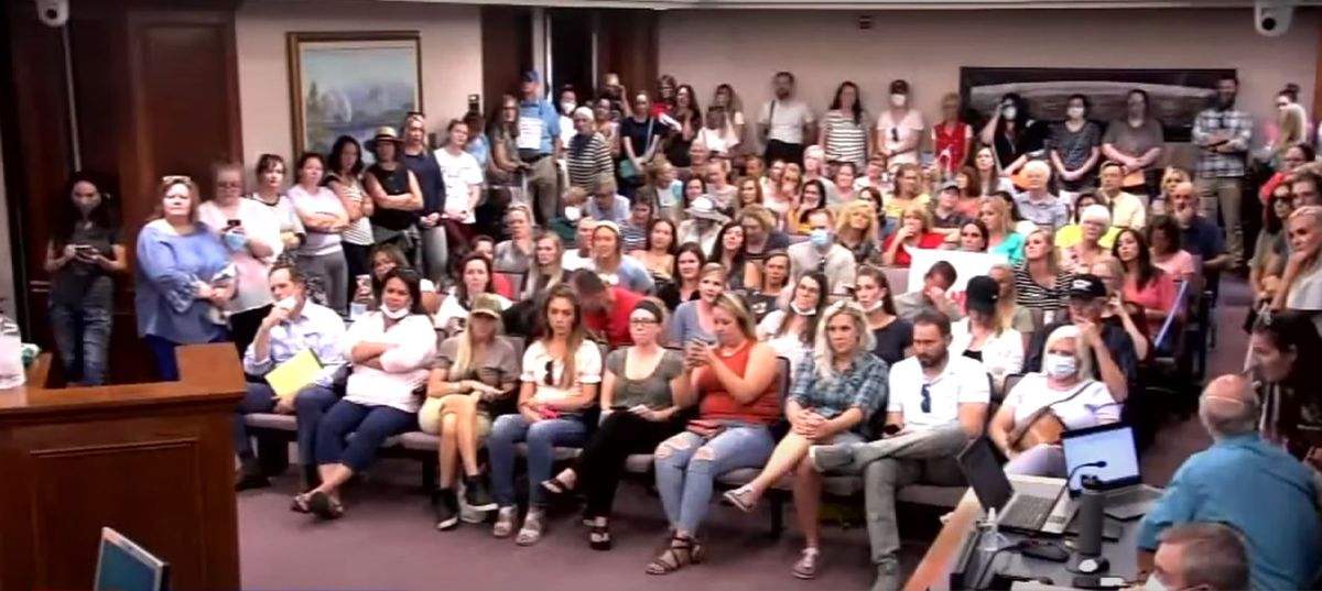 Anti-maskers blast COVID-19 ‘hoax’ at meeting to reopen
schools 1 Anti-maskers blast COVID-19 ‘hoax’ at meeting to reopen
schools 1