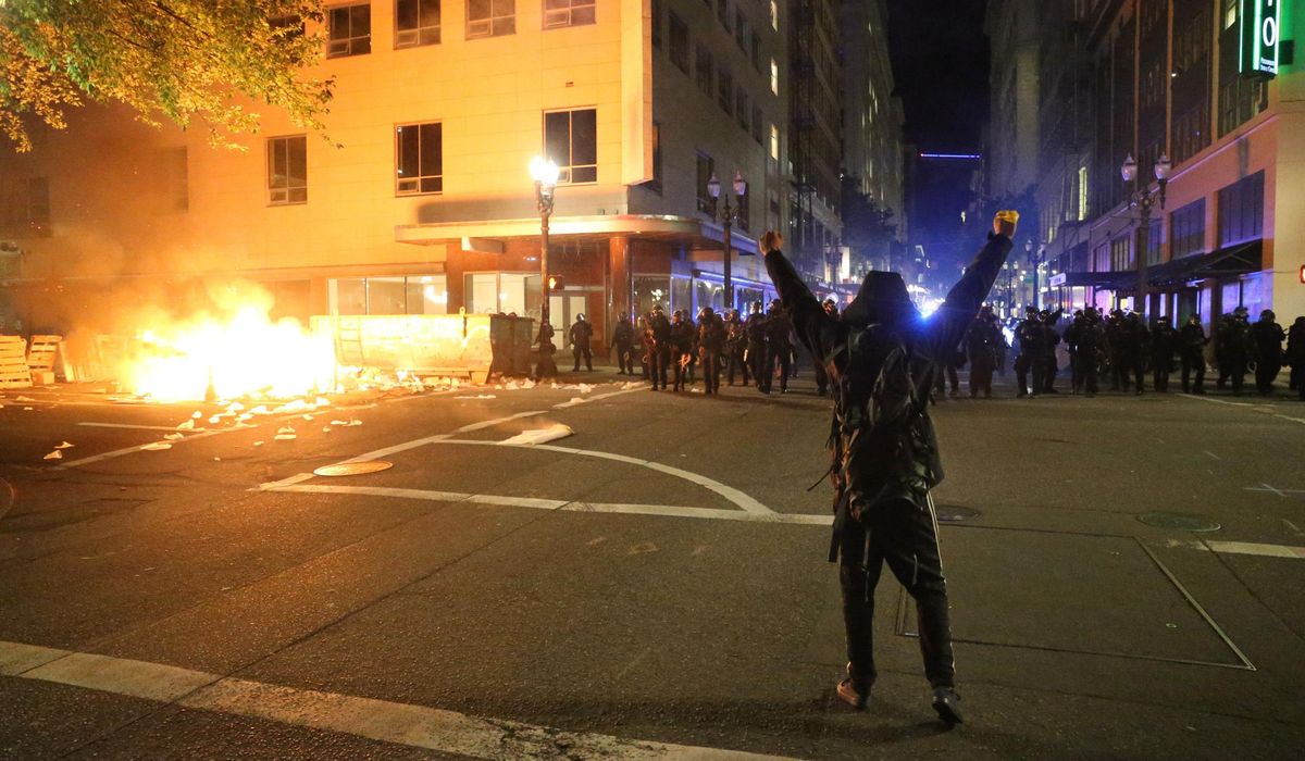 Portland protesters face federal charges for assaulting
officers, defacing courthouse 1