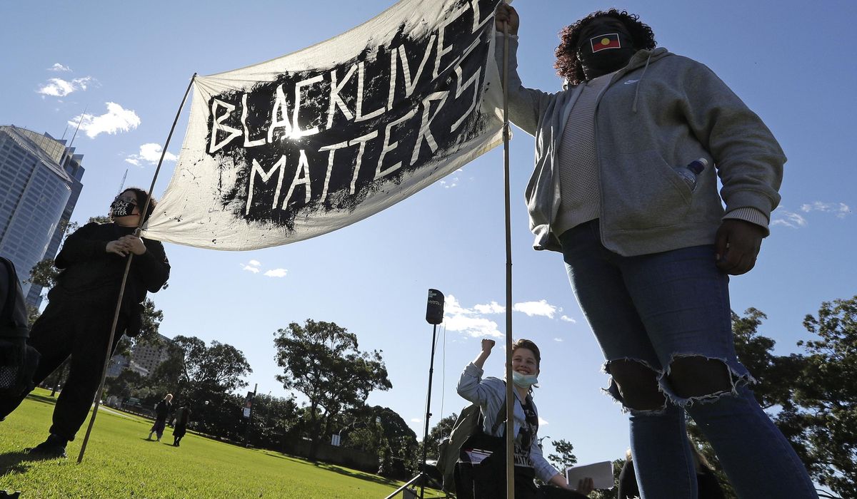 Thousands rally at Black Lives Matter protests in
Australia 1