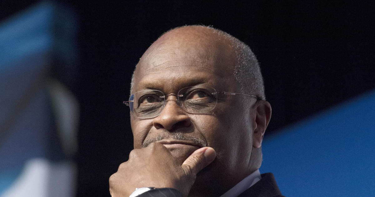 Former GOP candidate Herman Cain hospitalized with
COVID-19 1
