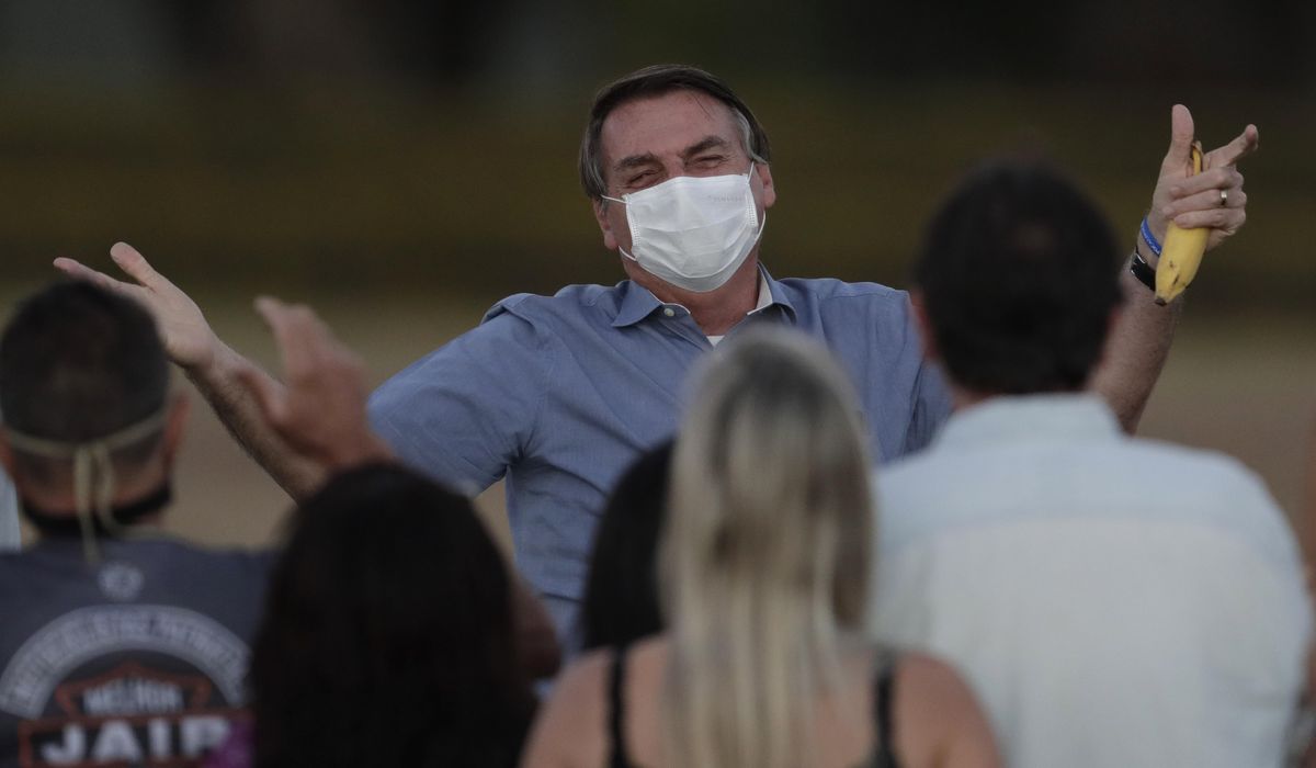 Brazil's Bolsonaro says he tested negative for
coronavirus 1