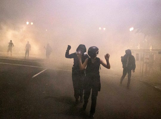 Portland, Oregon, police declare Saturday gathering a riot
after another night of protest, unrest 1