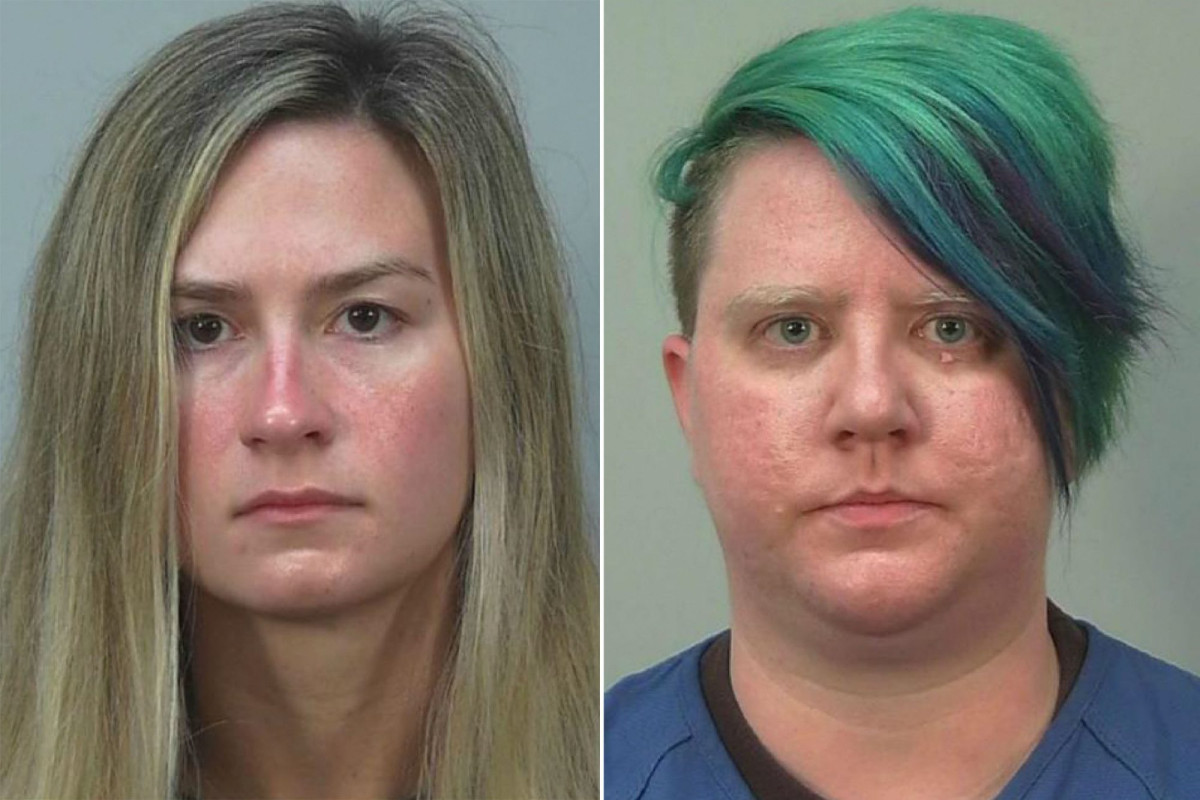 Two women charged with beating Wisconsin lawmaker during
protest 1