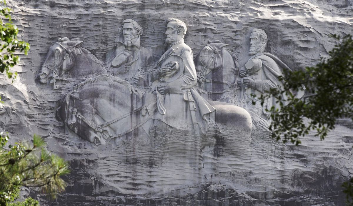 Armed protesters march through Georgia's Stone Mountain
Park 1