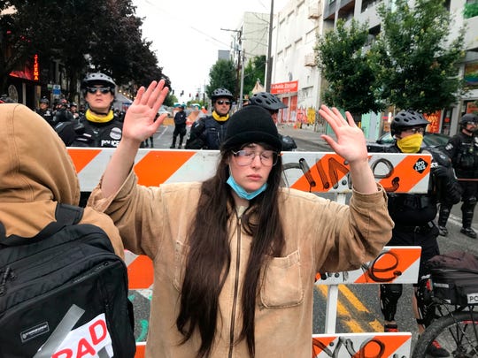 Seattle police are clearing the CHOP zone and making arrests
after mayor orders protesters to leave 1