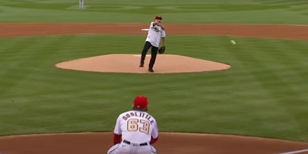 MLB season opens with pathetic 1st pitch by Dr.
Fauci 1
