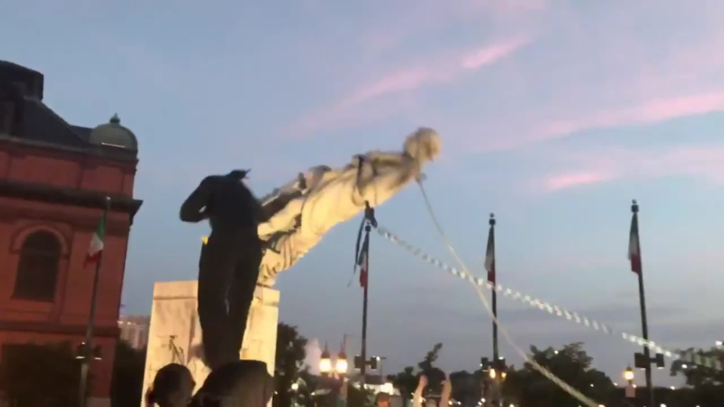 Baltimore protesters toppled a Christopher Columbus statue
and threw it in a harbor 1