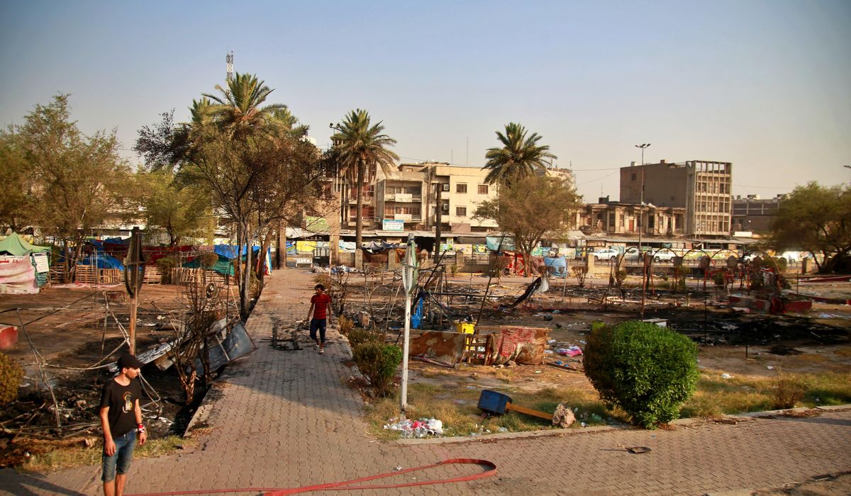 Officials: 2 protesters killed in new clashes in
Baghdad 1