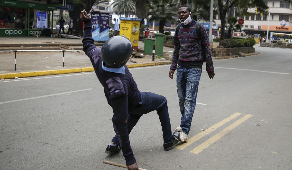 Tear gas, arrests as Kenyans protest police
brutality 1