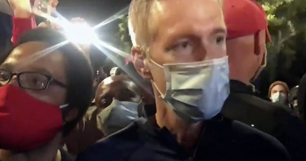 Portland mayor joins protest: Cursed, told to resign,
tear-gassed 1