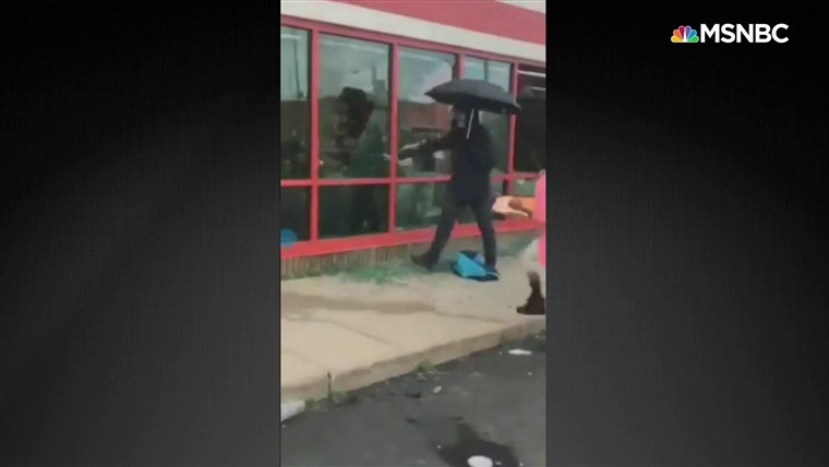 'Umbrella Man' aimed to 'incite violence' during George
Floyd protests, police say 1