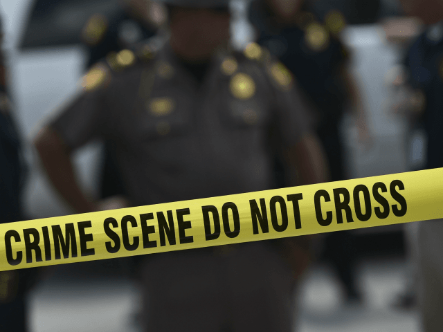 Three Officers Wounded as Prisoner Opens Fire in
Chicago 1
