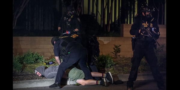Oregon AG sues feds over arrests of Portland
protesters 1