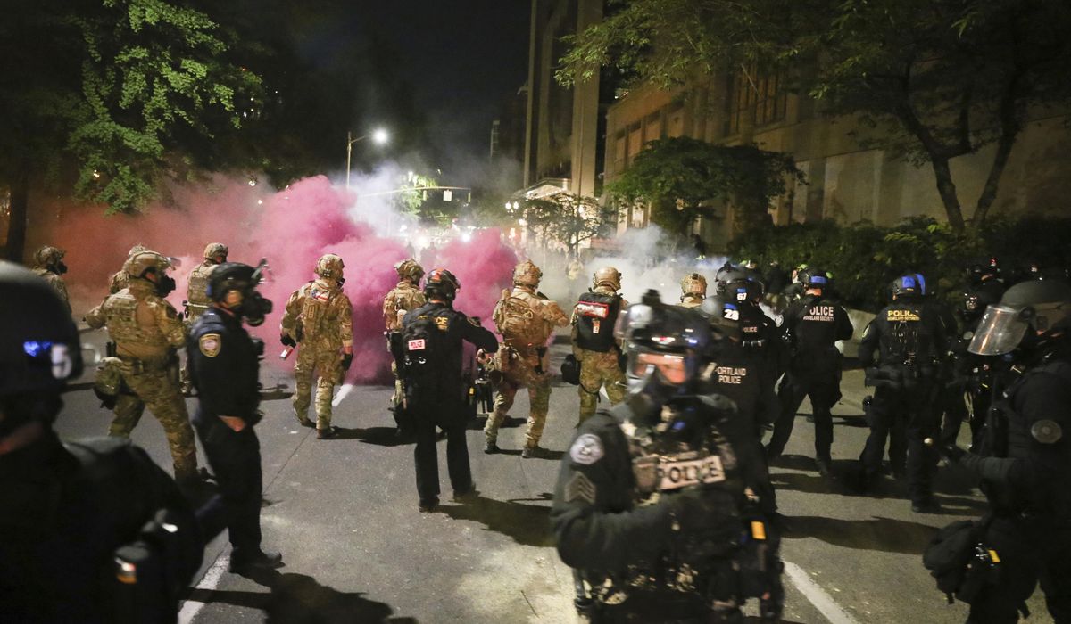 Oregon sues feds over Portland protests as unrest
continues 1