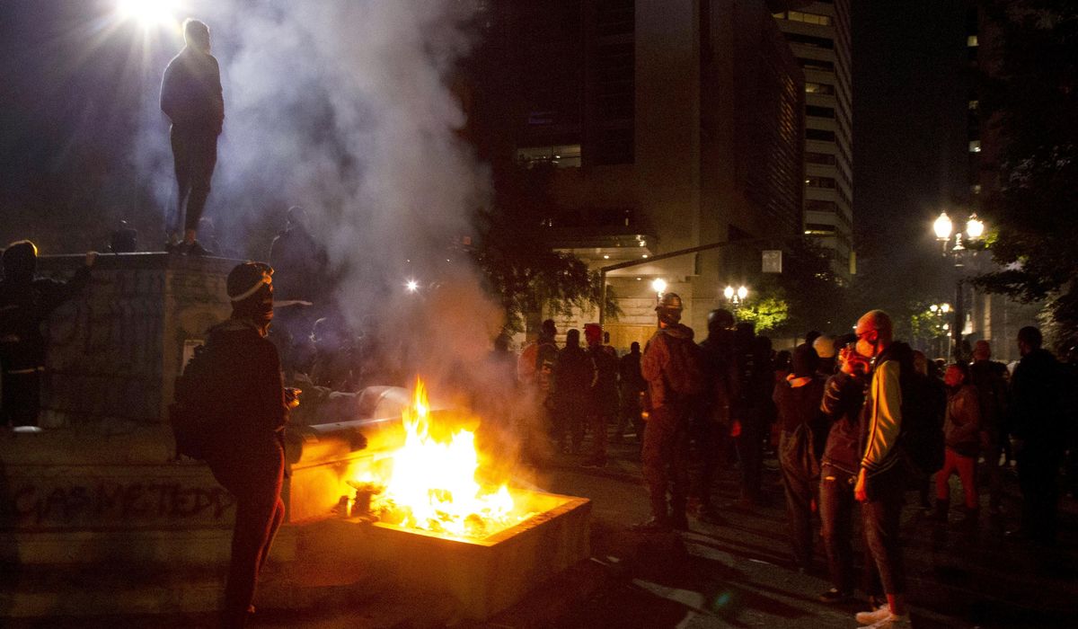 Chaotic protests prompt soul-searching in Portland,
Oregon 1