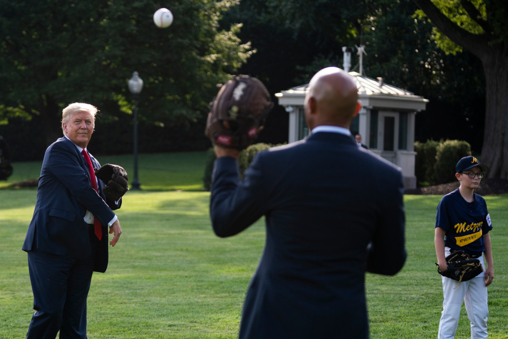 Trump, Mariano Rivera play catch to mark opening day 1