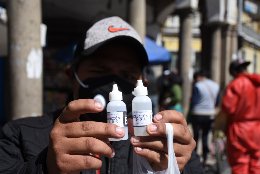 Bolivians line up to buy fake – and toxic – coronavirus
cure 1