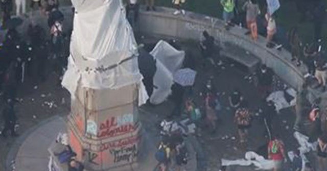 VIDEO: Twelve Protesters Arrested After Clash with Chicago
Cops over Columbus Statue 1
