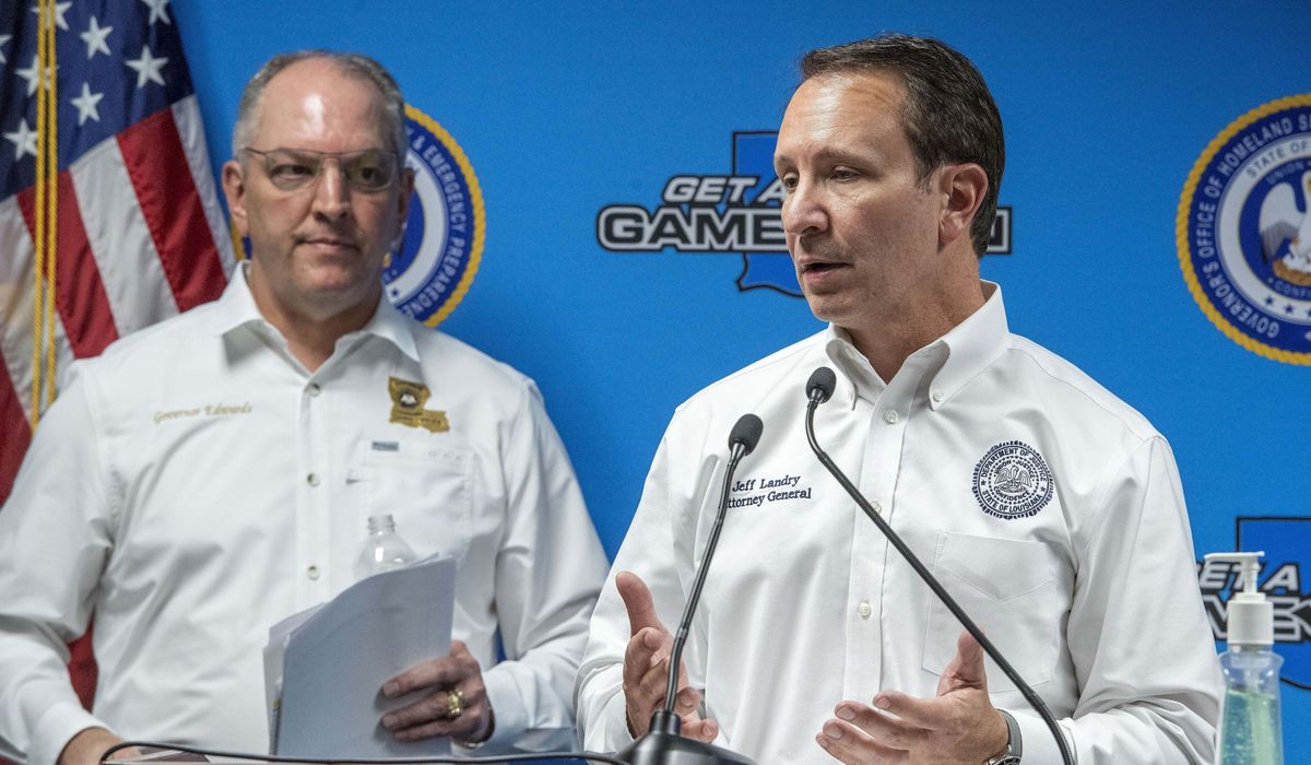Analysis: Mask mandate marks latest Edwards, Landry
quarrel 1