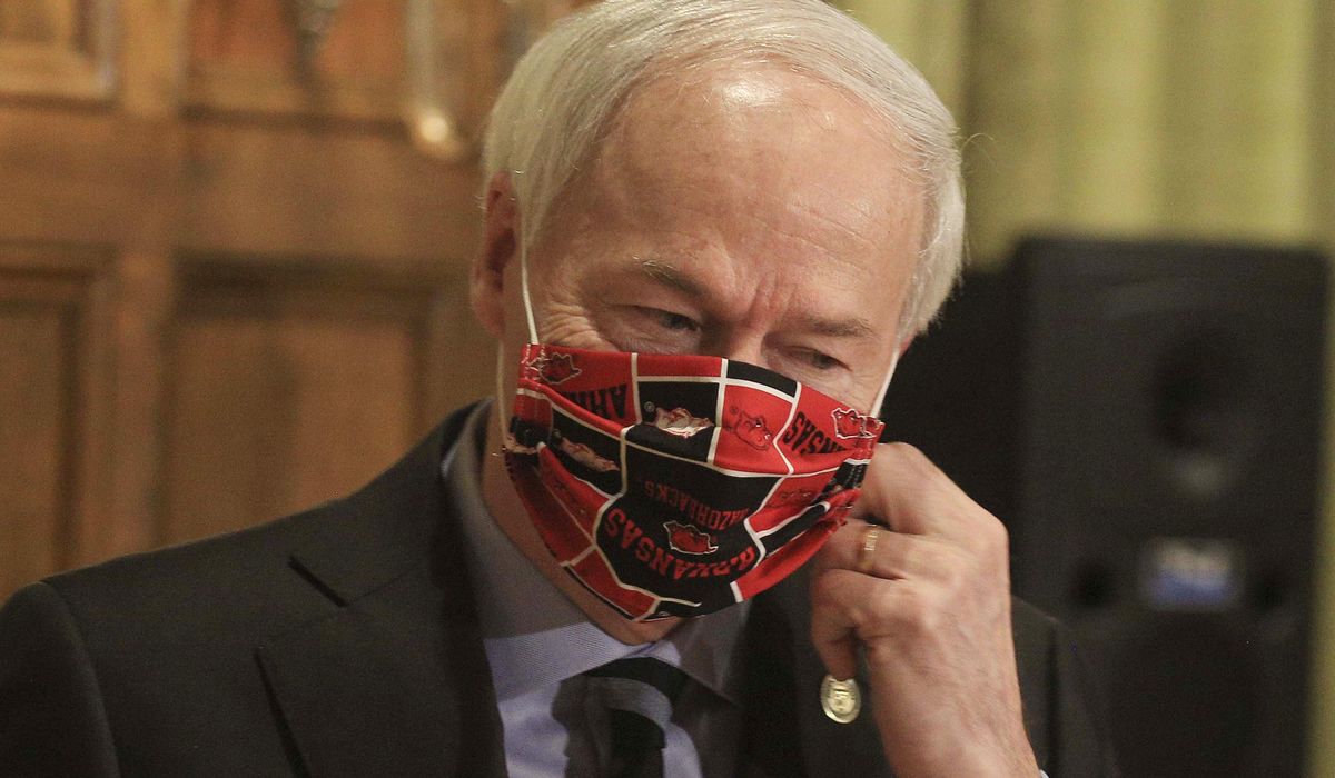Arkansas governor: Masks 'shouldn’t be about
politics' 1