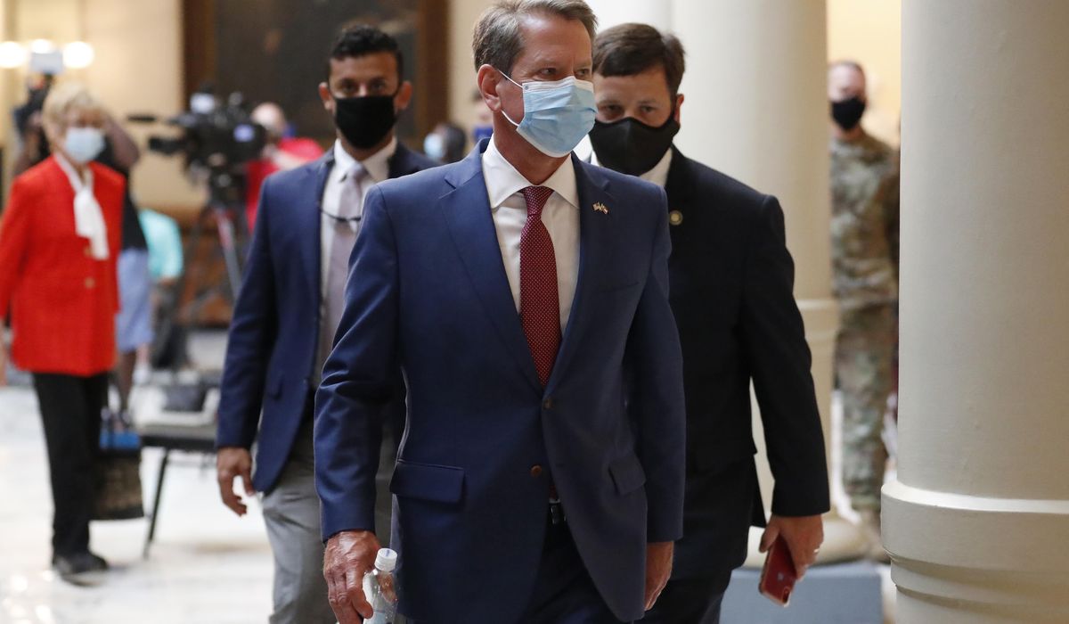 Georgia governor backs out of hearing on Atlanta mask
order 1