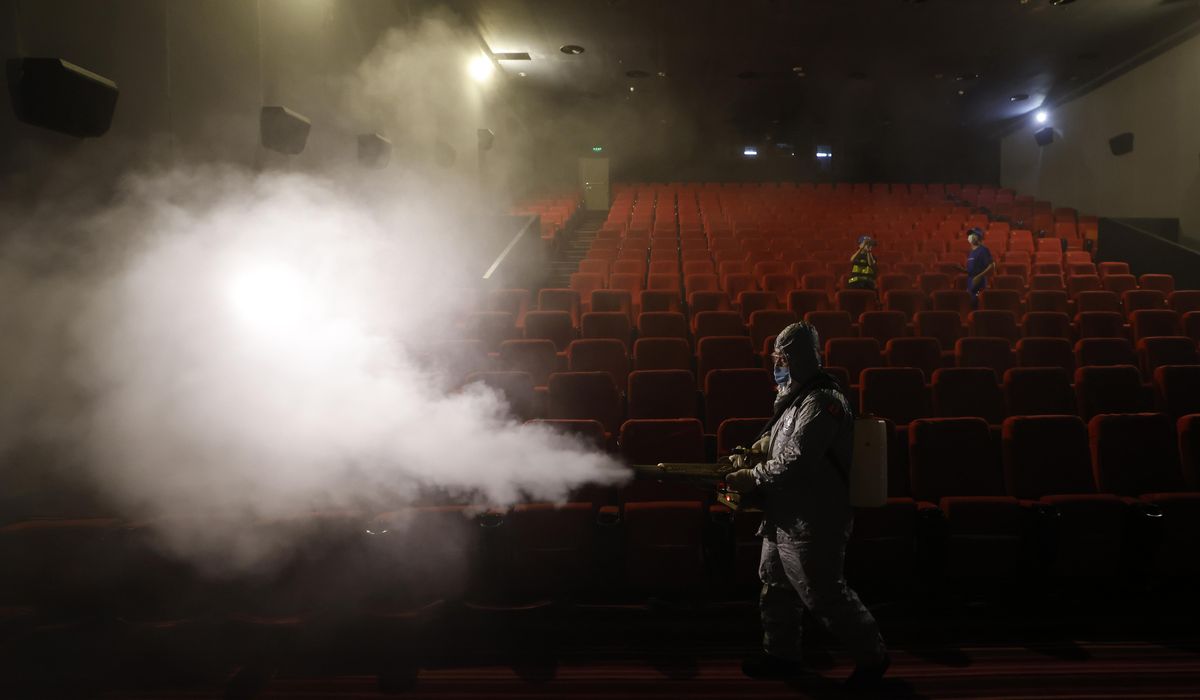 Beijing partly reopens movie theaters as virus
declines 1