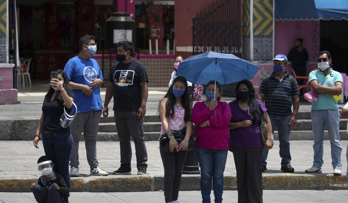 Mexico records near-record daily deaths, coronavirus
cases 1